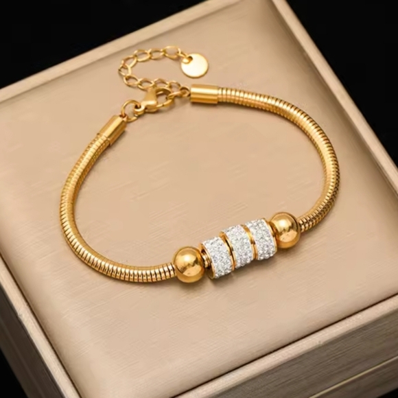 Elegant Gold Bracelet with Silver Accents - Picture 1 of 4